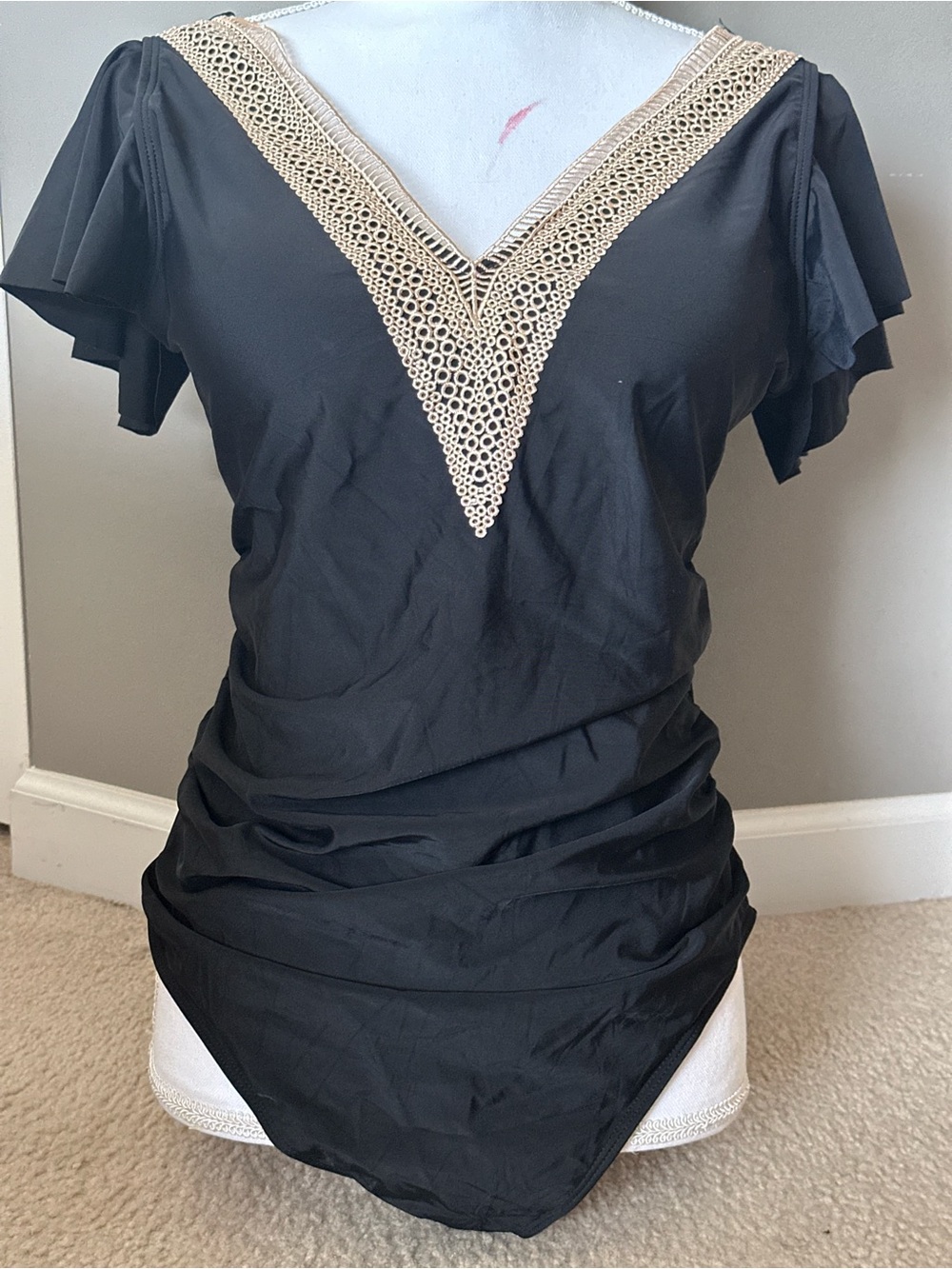 NWOT Black One-Piece Swimwear with Cream Crochet-Style V-Neck